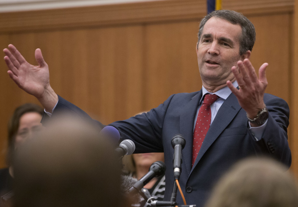 Virginia Gov.-elect Ralph Northam speaks to the media at the Capitol in Richmond, Va., Democrats see his win Tuesday as the beginning of an anti-Trump surge likely to crest in 2018.