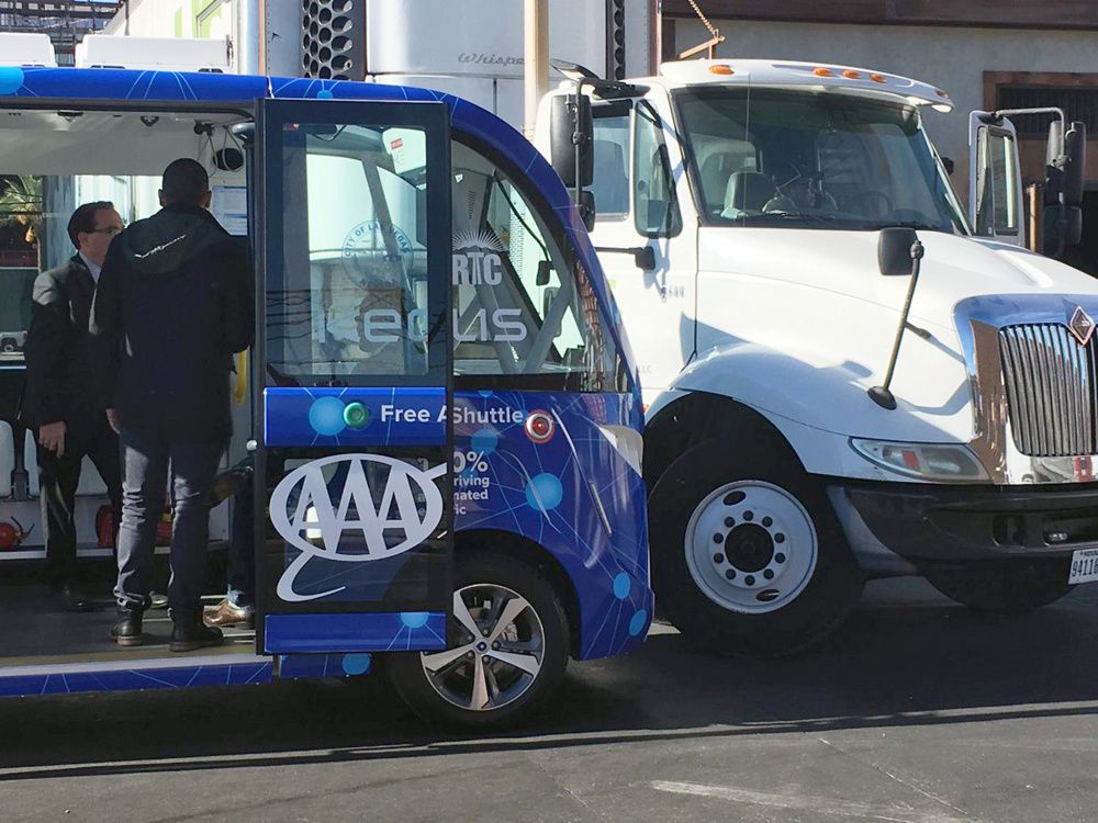A driverless shuttle bus was hit by a big rig in Las Vegas on Wednesday less than two hours after the automated ride service was launched to great fanfare.