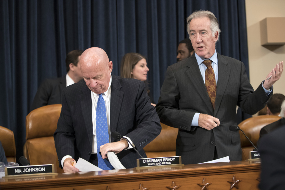 House Ways and Means Committee Chairman Kevin Brady, R-Texas, left, calls for a short recess to consider an amendment, to the objections of Rep. Richard Neal, D-Massachusetts, right, the ranking member, as the Republican tax bill debate enters a final day, on Capitol Hill in Washington on Thursday.