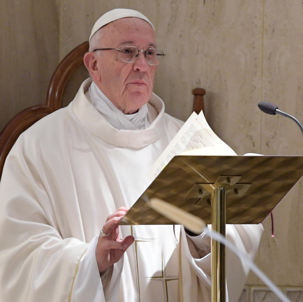 Pope Francis celebrates Mass at the Santa Marta Chapel at the Vatican on Friday.