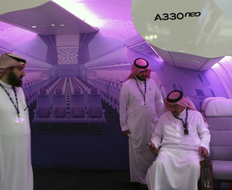 An Airbus wide-body mockup garners attention at a biennial air show Wednesday in Dubai, where members of the aerospace industry completed significant transactions.