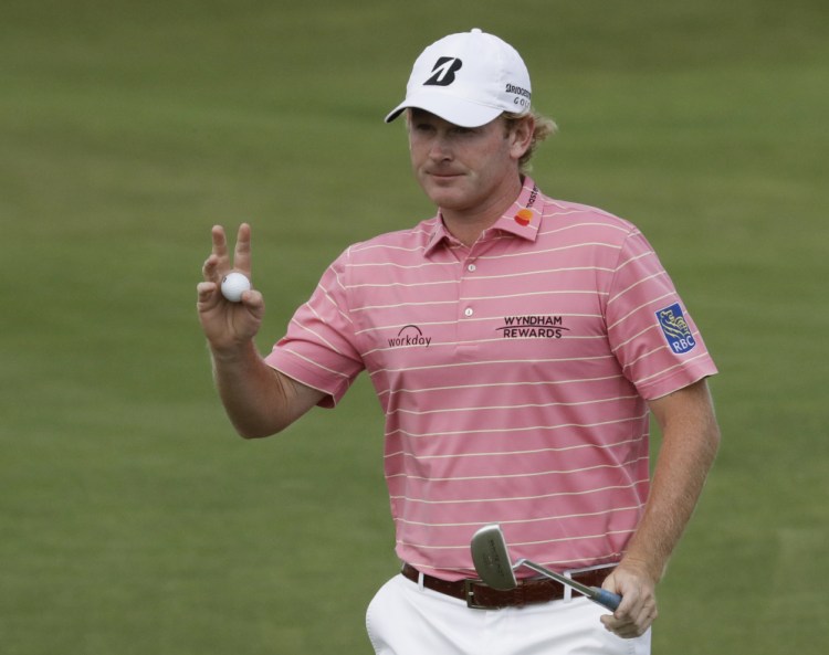 Brandt Snedeker waves after putting on the 12th hole during the fourth round of the U.S. Open in June. Snedeker hasn't played since withdrawing from the British Open in July.