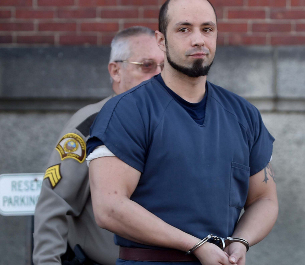 Luc Tieman leaves court in Skowhegan in February after entering a not guilty plea in the killing of his wife, whose body was found buried in his parents' backyard in Fairfield.