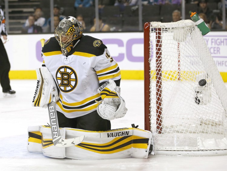 Bruins goalie Anton Khudobin stops a shot by the San Jose Sharks during the second period Saturday night in San Jose, Calif. Boston won the game, 3-1.