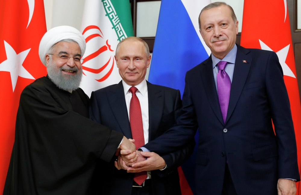 From left, President of Iran Hassan Rouhani, Russian President Vladimir Putin and Turkish President Recep Tayyip Erdogan at the start of the talks in Sochi on Wednesday.