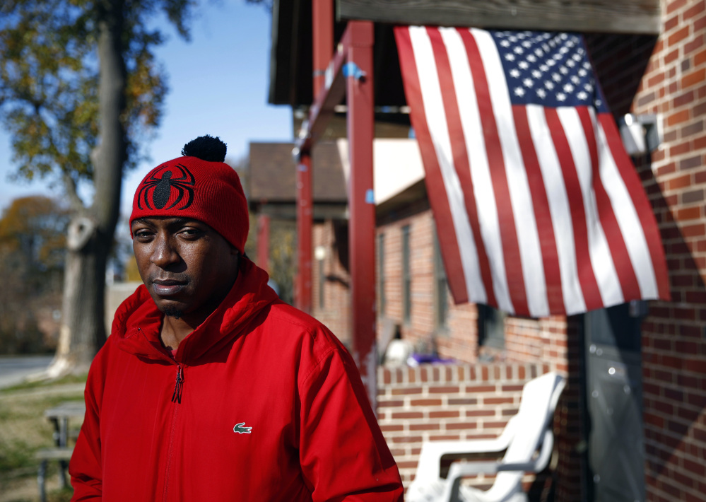 Sabein Burgess outside his mother's home in Baltimore, Wednesday. Burgess says the grinding years in prison as an innocent man have taken its toll.