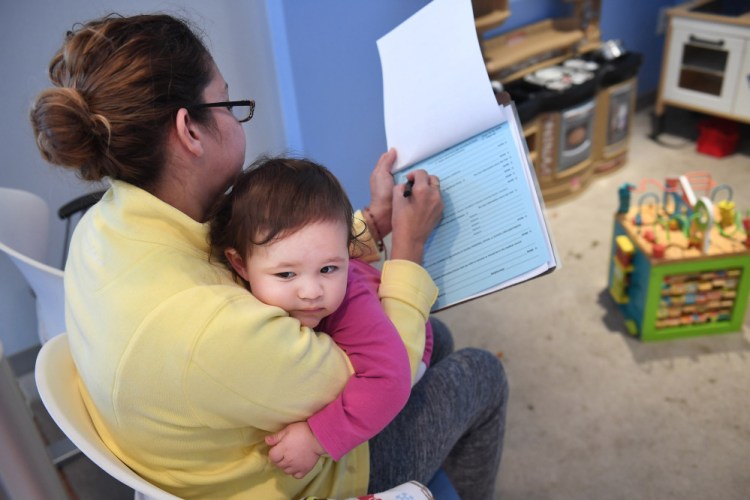 Marbell Castillo, who takes her granddaughter Maia to her doctor appointments because her daughter works two jobs, worries about the little girl's health care if CHIP isn't funded.