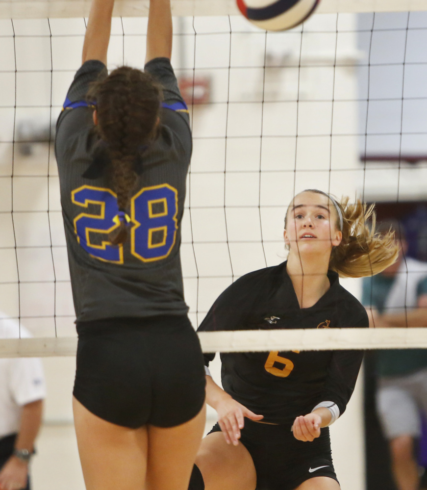 Megan Connelly of Cape Elizabeth, watching her volley go over the net during the state final against Falmouth, came up big time after time for the Capers, who capped a perfect season with a state championship.