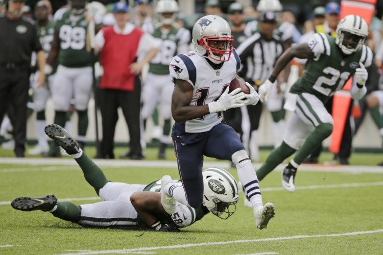 Patriots receiver Brandin Cooks breaks a tackle by Darron Lee of the New York Jets on Oct. 15. Cooks has been a great fit with New England and hopes it will be a long-term one.