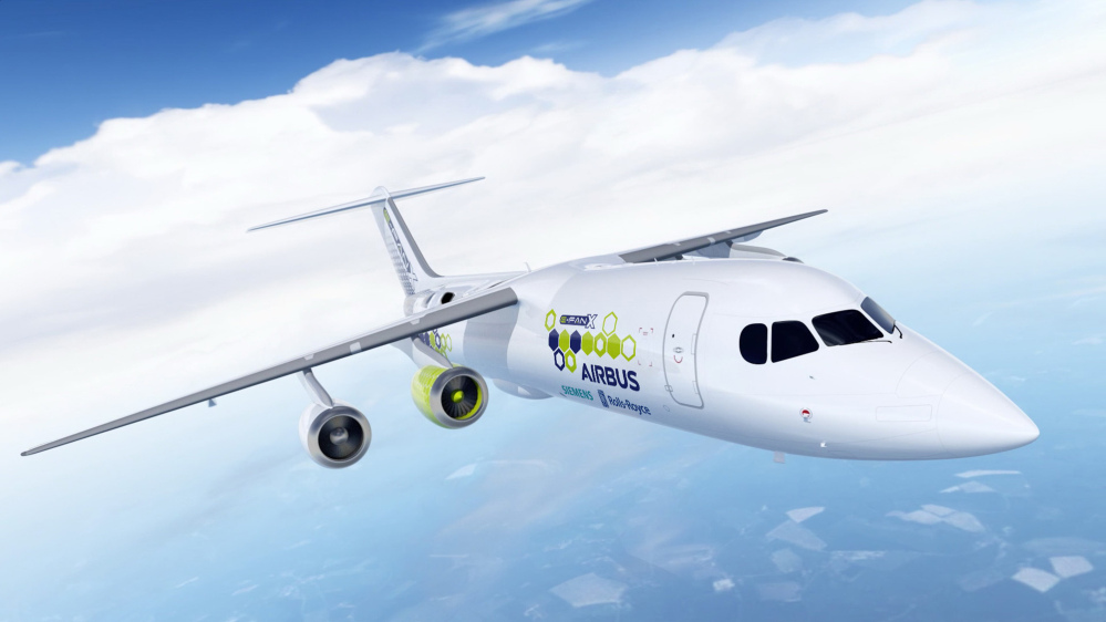 The artist rendering provided by Airbus on Tuesday shows an Airbus e-FanX hybrid test plane. The aircraft will fly with one electric turbofan motor and three conventional engines. The power for the electric engine is produced by a turbine within the plane that serves as a generator. 