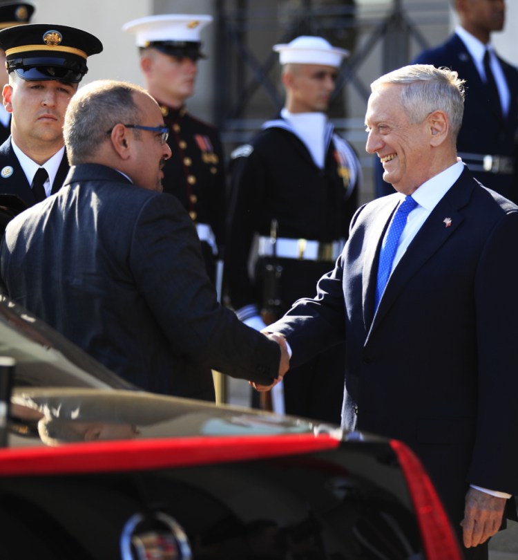 Secretary of Defense Jim Mattis, right, greets Bahrain's Crown Prince Salman bin Hamad Al Khalifa during a welcoming ceremony at the Pentagon on Wednesday.
