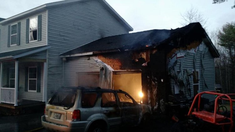 A garage on Red Maple Lane was significantly damaged Tuesday, but quick thinking by an Augusta firefighter kept the fire from spreading to the home.