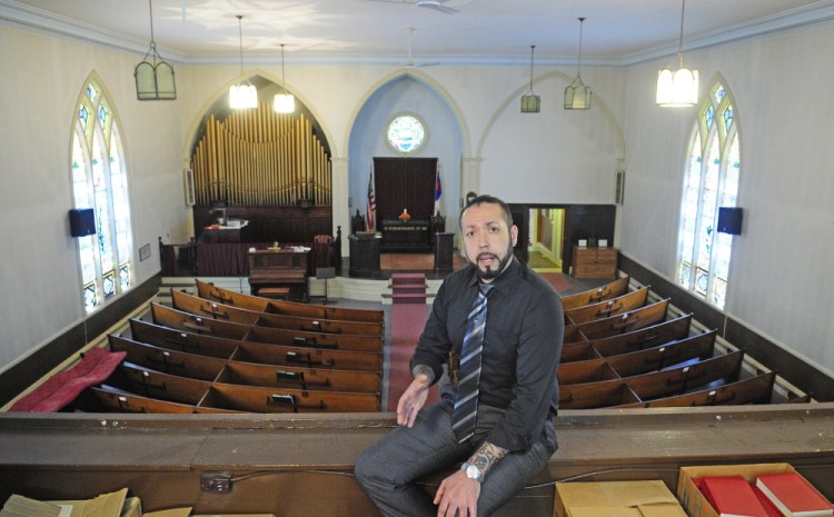 David Boucher talks about his plans to use a former church as a tasting room for Lost Orchard Brewery during a tour on April 30, 2015 in Gardiner. The church is set to be sold at public auction Dec. 20.