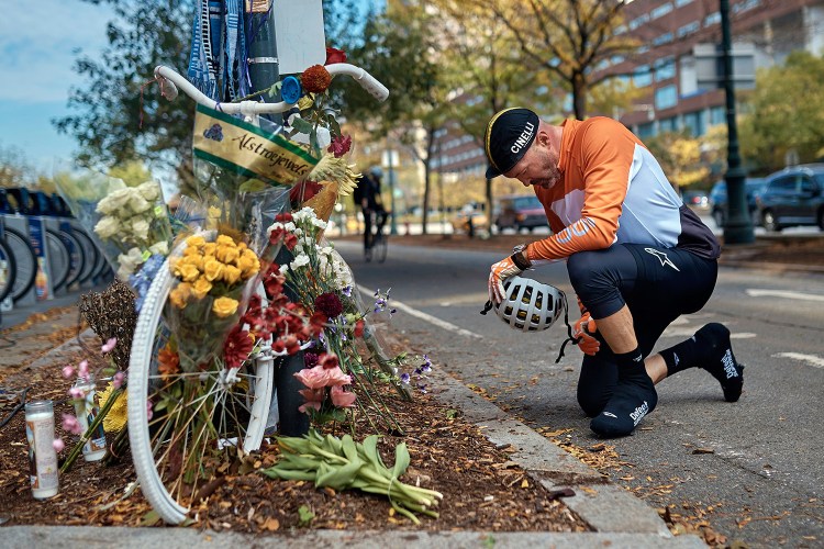 Eric Fleming, 41, expresses his condolences in front of a bike memorial where people leave flowers to remember the victims of Tuesday's attack, on Thursday in New York. 
