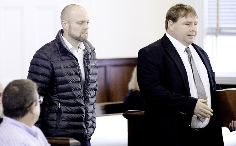 Robert Trundy, left, enters the Oxford County Superior Court with his attorney, Scott Lynch, in Paris on Wednesday. 