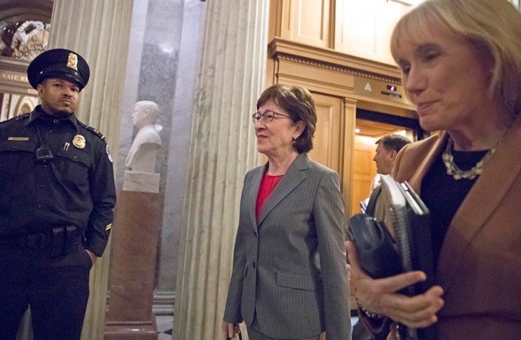 Sen. Susan Collins, R-Maine, with Sen. Maggie Hassan, D-N.H., right, head to the Senate floor for votes on Capitol Hill on Monday evening. The tax reform bill that Collins could support would balloon the deficit and provide hefty tax cuts for the wealthy, while raising taxes on about 50 percent of Americans in 2027, said the Tax Policy Center, a Washington-based think tank. 