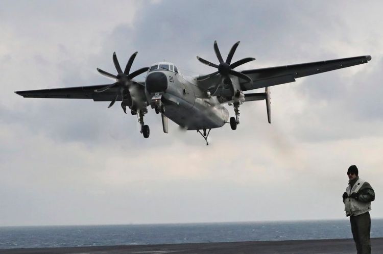 A U.S. Navy C-2 Greyhound of the kind that crashed in the Pacific with 11 aboard on Wednesday morning approaches the deck of the Nimitz-class aircraft carrier USS Carl Vinson during a military exercise in March. 