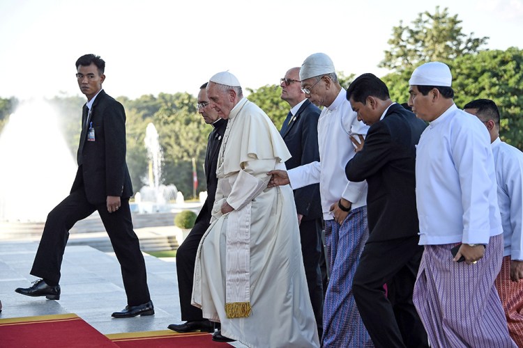 Pope Francis and Myanmar's President Htin Kyaw attend a welcoming ceremony at the presidential palace in Naypyidaw, Myanmar, Tuesday.