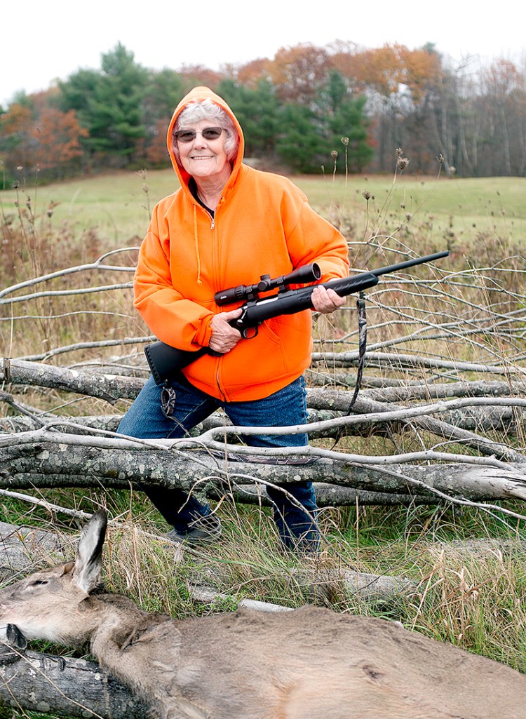 Terry Labbe, 80, of Lewiston shot her first deer, a button buck, on her son's property in Greene. She has never hunted before this deer season. (Daryn Slover/Sun Journal)