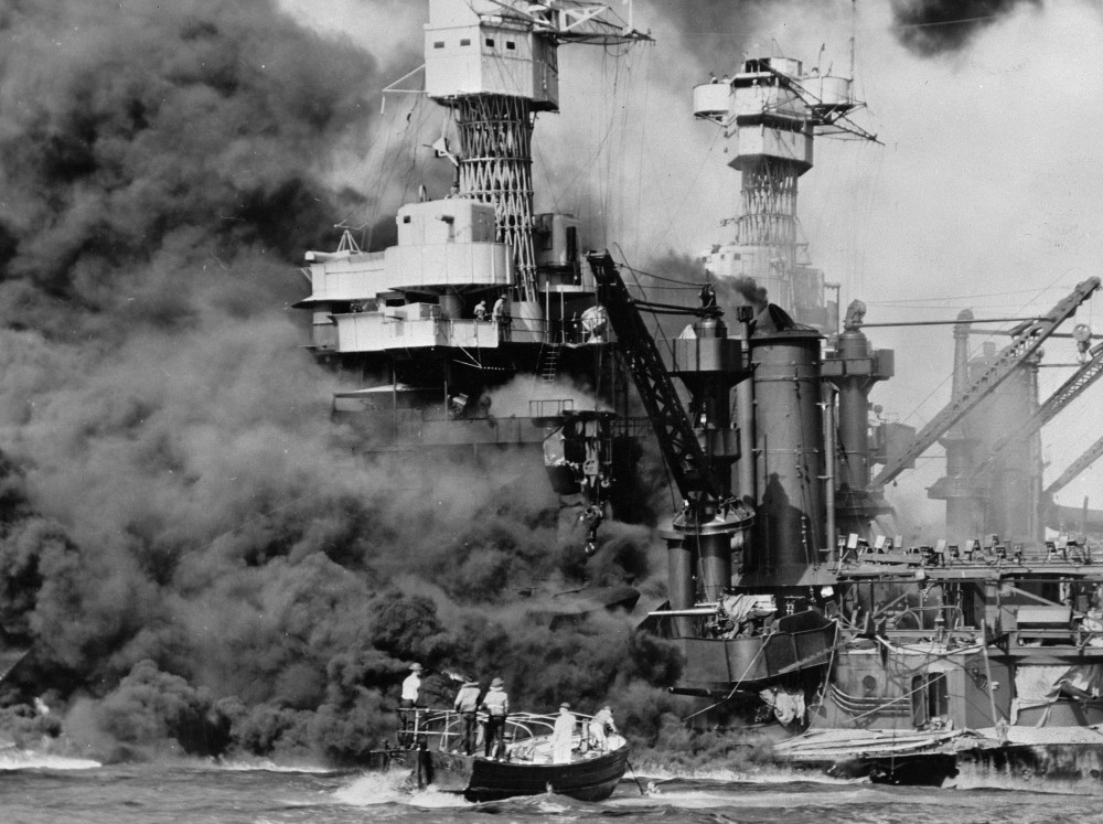 A small boat rescues seamen from the USS West Virginia in Pearl Harbor, Hawaii, on Dec. 7, 1941. About 2,400 U.S. service members and civilians were killed in the attack.