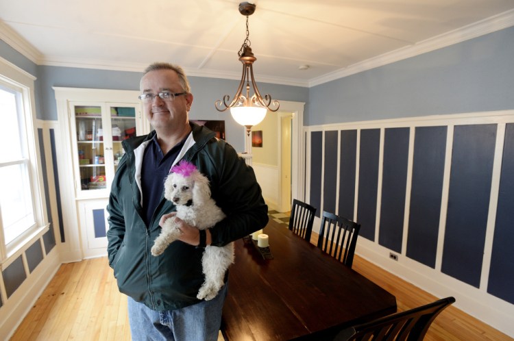 Lars Whelan inside his home and AirBnB rental on Noyes Street in Portland. Wheland is a member of Share Portland, a group of short-term rental operators, and says he doesn't know where the shortfall in registration came from as the city gave plenty of notice.