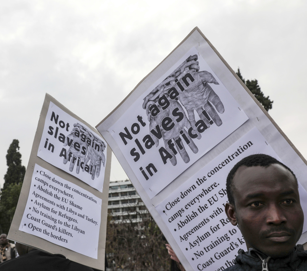 Migrants from Africa take part in a demonstration in Athens protesting EU policy over migration from Africa.