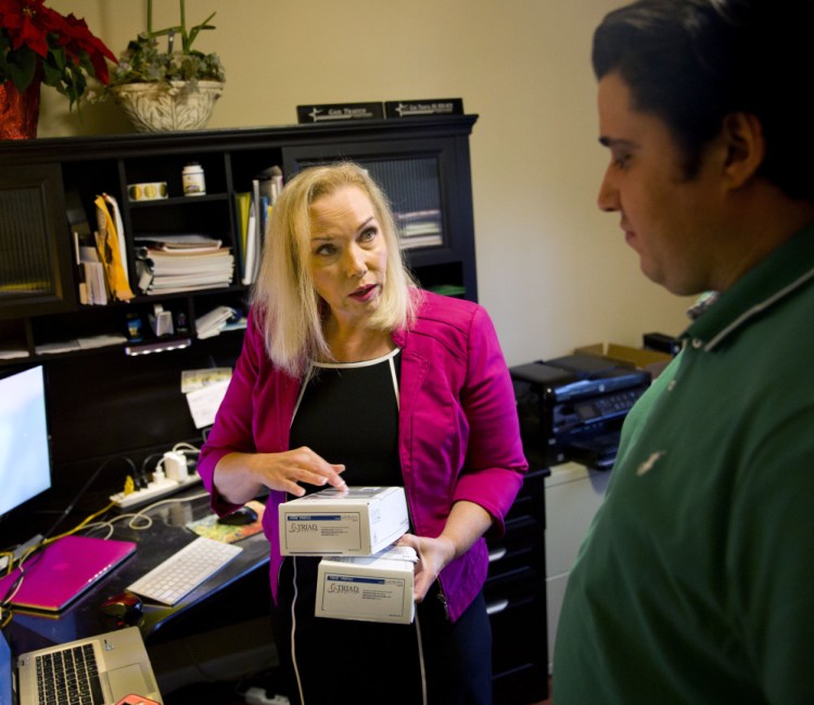 Gail Trauco, owner of The PharmaKon in Georgia, used a health broker to find a plan with more choices after Trauco's original insurer restricted the firm to a health maintenance organization with fewer available doctors.