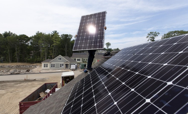 Maine's rooftop solar installers won a four-month reprieve Tuesday when the Maine Public Utilities Commission voted to maintain the status quo on how homeowners and small businesses are compensated for the electricity they feed into the grid. A rule change, which was being challenged last week in court, is under consideration by regulators.