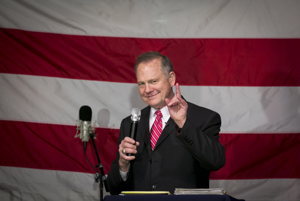 Roy Moore, Republican candidate for Senate from Alabama, speaks at a campaign rally in Fairhope, Ala., on Tuesday.