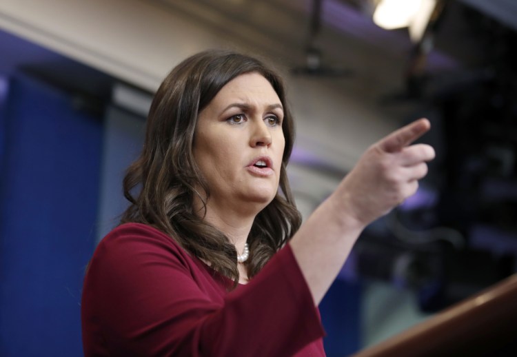 White House press secretary Sarah Huckabee Sanders picks out a reporter to ask a question during a press briefing at the White House on Monday in Washington.