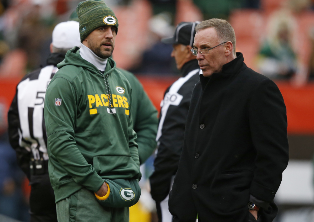 Packers quarterback Aaron Rodgers, left, could be back in action Sunday against Carolina after missing the past eight weeks with a collarbone injury.