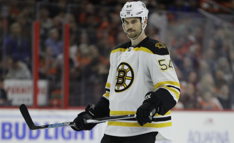 Defenseman Adam McQuaid hasn't played since Oct. 19 because of a broken leg, but he finally returned to practice with the Bruins on Monday. There's still some question about where he fits into the lineup when he's ready to go.