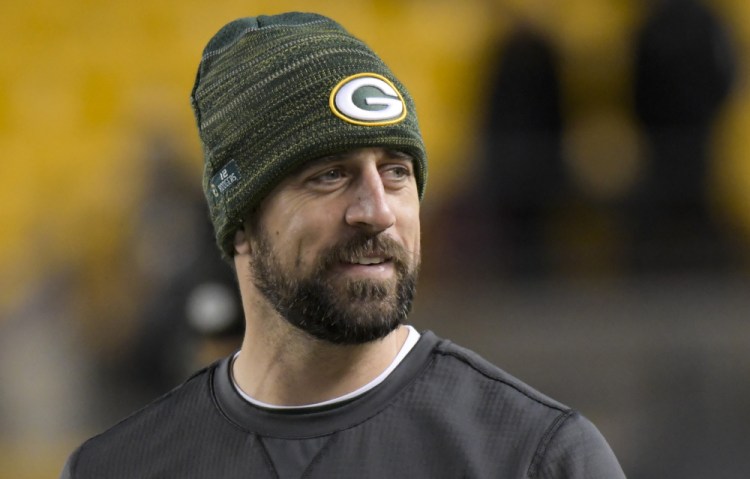 Green Bay quarterback Aaron Rodgers was medically cleared to play Tuesday night after missing eight weeks with a broken collarbone on this throwing side. He will start for the Packers against the Panthers on Sunday hoping to keep Green Bay's playoff hopes alive.