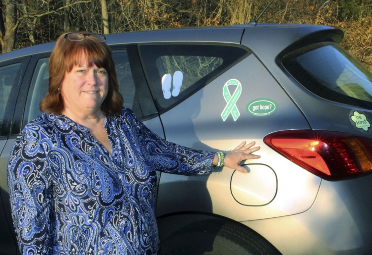 Although her car displays stickers in memory of the 26 victims of the mass shooting at Sandy Hook Elementary, Suzanne Davenport often would rather not talk about it.