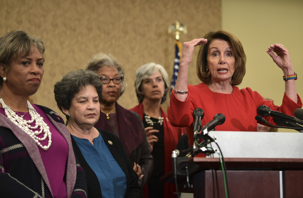 House Minority Leader Nancy Pelosi of Calif., right, and fellow Democratic congresswomen warn Wednesday that they may vote against a short-term spending bill unless Republicans "show respect for our values and priorities" on issues like the Children's Health Insurance Program.