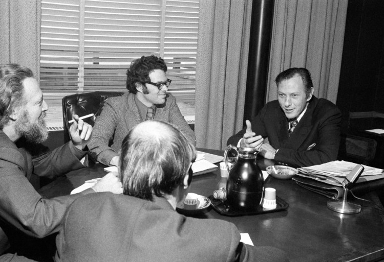 Clifford Irving, author of an autobiography on industrialist Howard Hughes, planned to be published by McGraw-Hill, meets with newsmen at McGraw-Hill offices in New York on Jan. 10, 1972. Hughes, in a telephone interview, questioned Irving's authenticity.