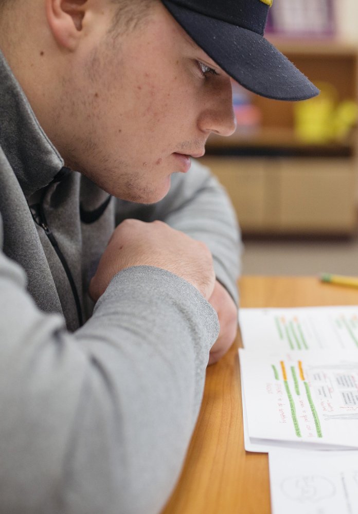 Scarborough high school senior Owen Garrard studies AP psychology during his academic enrichment and support time in teacher Sarah Blaisdell's classroom. Garrard has a weighted GPA of 96 and takes several honors and AP classes. 