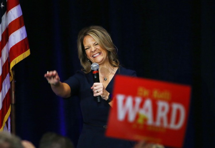 Former Republican Arizona state Sen. Kelli Ward is greeted by supporters at a campaign fundraiser, in Scottsdale, Ariz. Some Republican Party leaders warn that conservative candidates with problematic track records like Danny Tarkanian In Nevada or Ward can't win general election battles and will lead the party to lose seats in 2018.