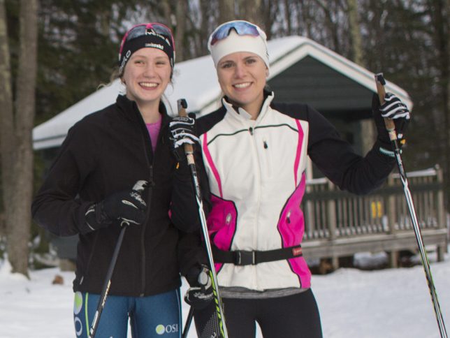 Skiers Olivia Skillings, left, of Maine Coast Waldorf and Sophia Laukli of Yarmouth are close friends who will compete against each other.