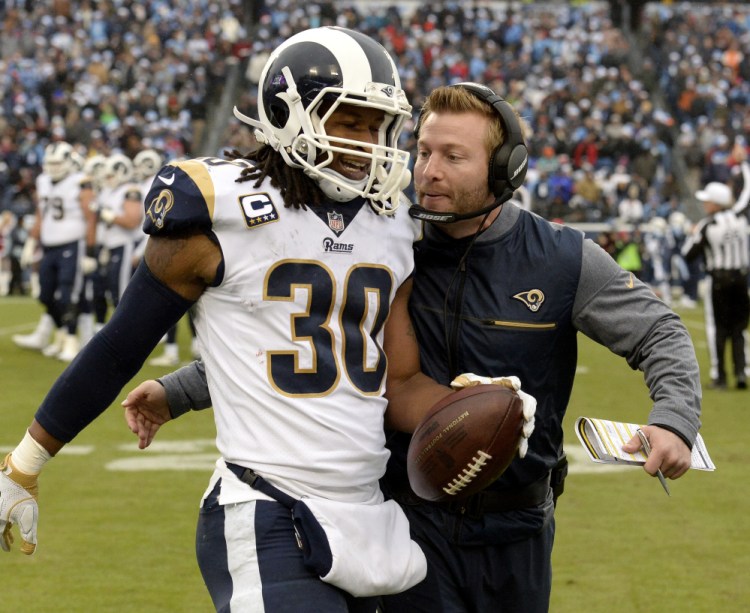 Los Angeles Rams RB Todd Gurley gets a pat on the back from Coach Sean McVay on Sunday. McVay's team has relied on Gurley for 38 percent of its yards from scrimmage.