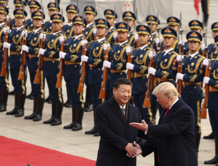 President Trump and Chinese President Xi Jinping participate in a welcome ceremony at the Great Hall of the People in Beijing on Nov. 9. Trump is ending his first year in office without welcoming a counterpart to visit the U.S.