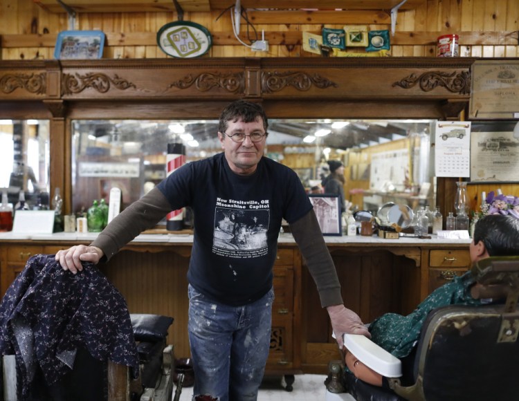 A 20-year resident of New Straitsville, Ohio, Tom Craig stands among the vestiges of the local barbershop, complete with original barber's chairs and mirrors. The space is now a museum, in line with the region's effort to promote Appalachia as a chic area with down-home charm and ample outdoor recreation.