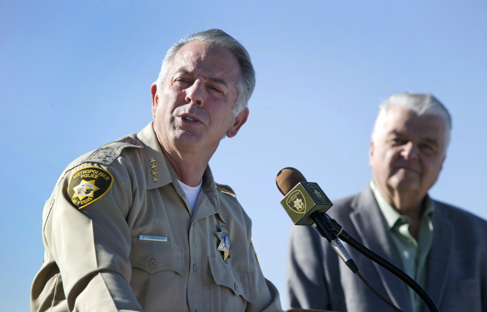 Clark County, Nevada, Sheriff Joe Lombardo, left, and Clark County Commission Chairman Steve Sisolak respond to questions during a Wednesday news conference on New Year's Eve security at Metro Police Headquarters in Las Vegas.