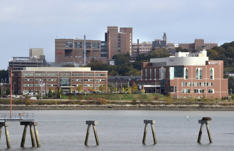 Mercy Hospital plans to relocate and open a new facility in 2021 at its Fore River Parkway campus in Portland, shown in foreground. The site now houses its urgent care center and medical offices.