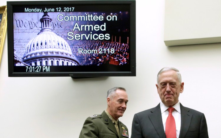 Defense Secretary James Mattis, right, and Joint Chiefs Chairman Gen. Joseph Dunford arrive for a House hearing in June. It is high time to find alternatives to trying to control international events through military means, the writer says.