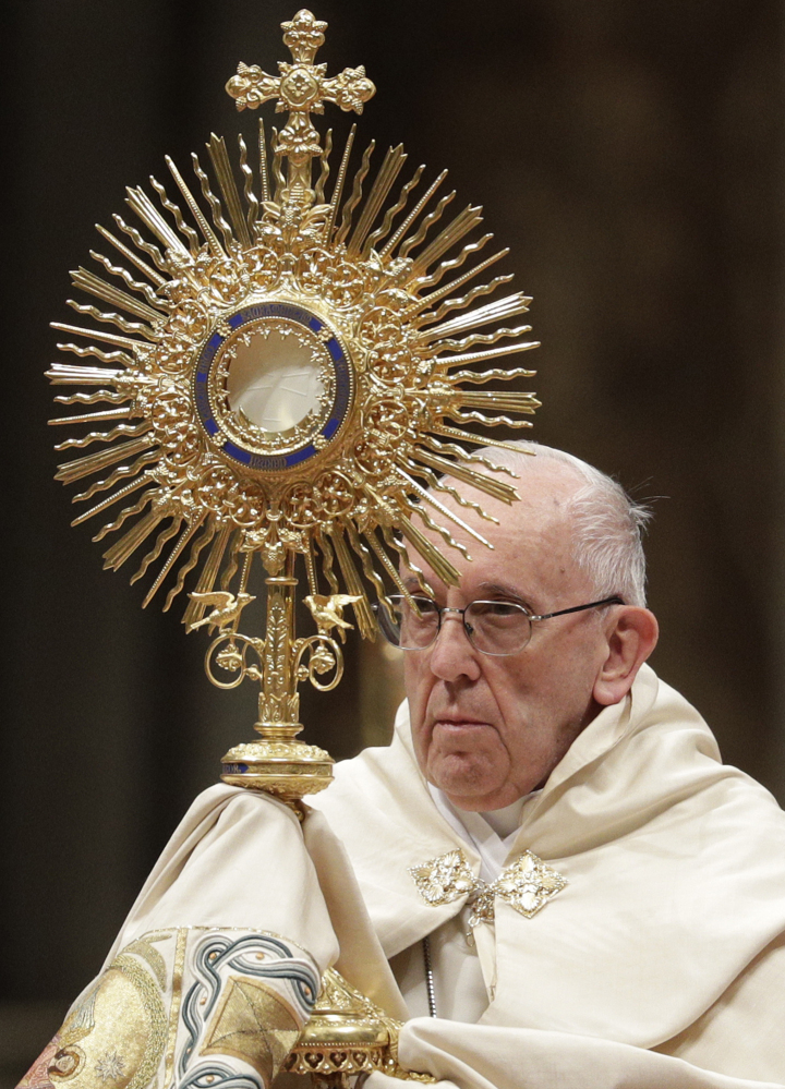 Pope Francis celebrates a New Year's Eve vespers Mass in St. Peter's Basilica at the Vatican on Sunday.