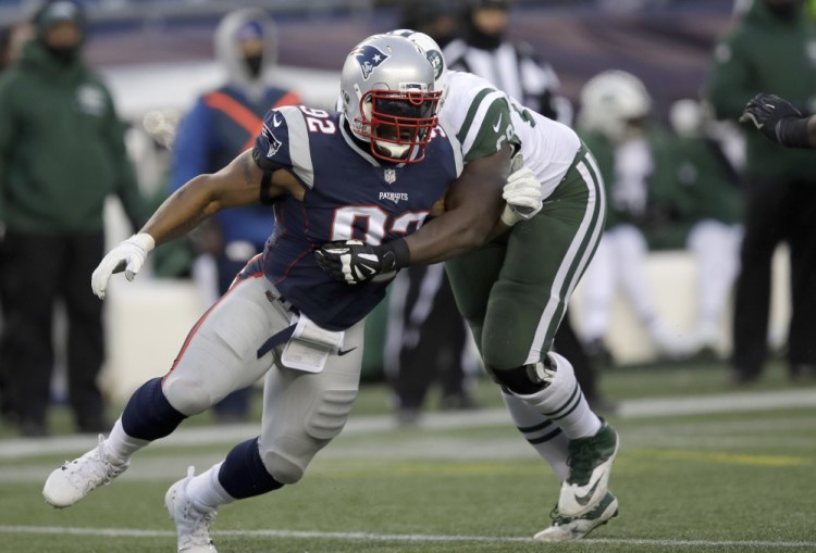 Patriots linebacker James Harrison forces past Jets tackle Kelvin Beachum on his way to a sack in the closing stages of New England's 26-6 victory Sunday.