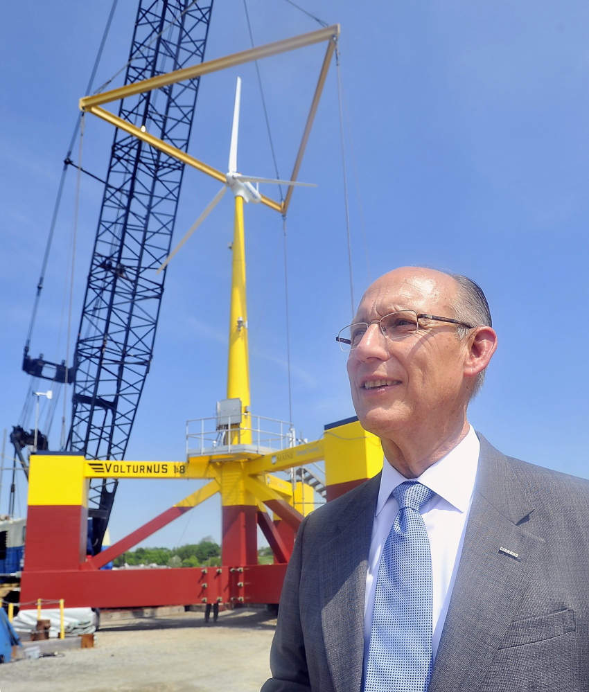 Peter Vigue, CEO of Cianbro, watches construction of a wind turbine in May 2013 at Cianbro's Eastern Manufacturing Facility in Brewer.
