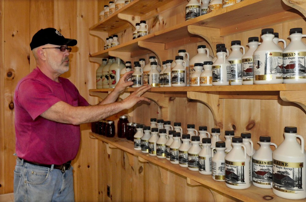 Russell Black raises cattle and produces maple syrup in his Black Acres Sugar Shack in Wilton. The growing national interest in "traceable" food holds promise in Maine.