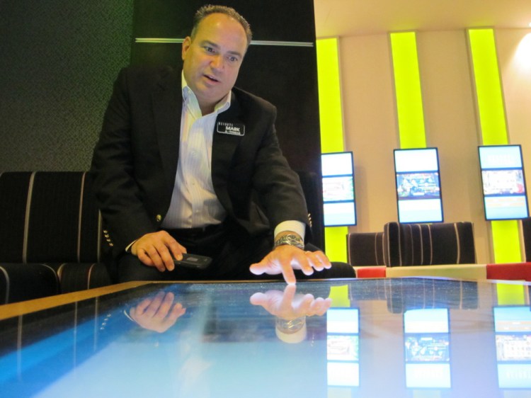 Mark Giannantonio, president of Resorts Casino Hotel in Atlantic City, N.J., demonstrates a tabletop internet gambling console at his casino. Resorts was the first U.S. casino to open outside Nevada. "I'm extremely optimistic about Atlantic City and the industry in 2018," he says. "We're very excited about the renaissance of Atlantic City; we think it's for real."